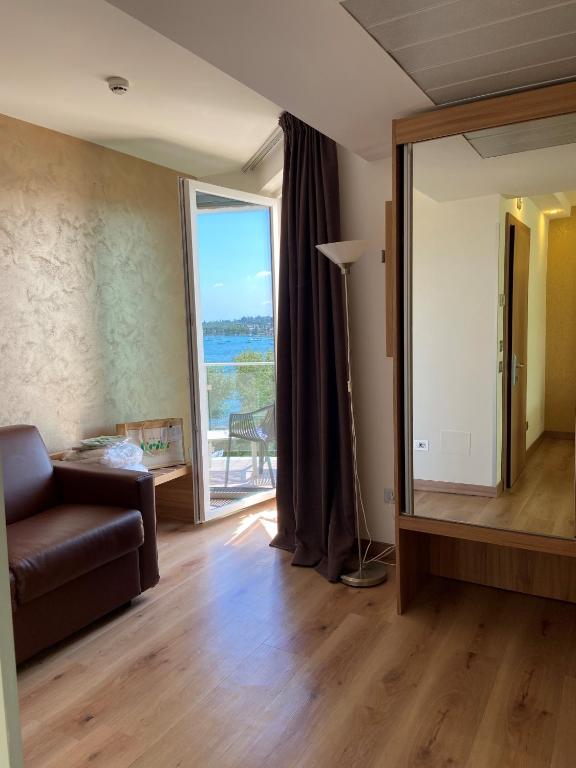 Postel nebo postele na pokoji v ubytování Kriss Internazionale Hotel
