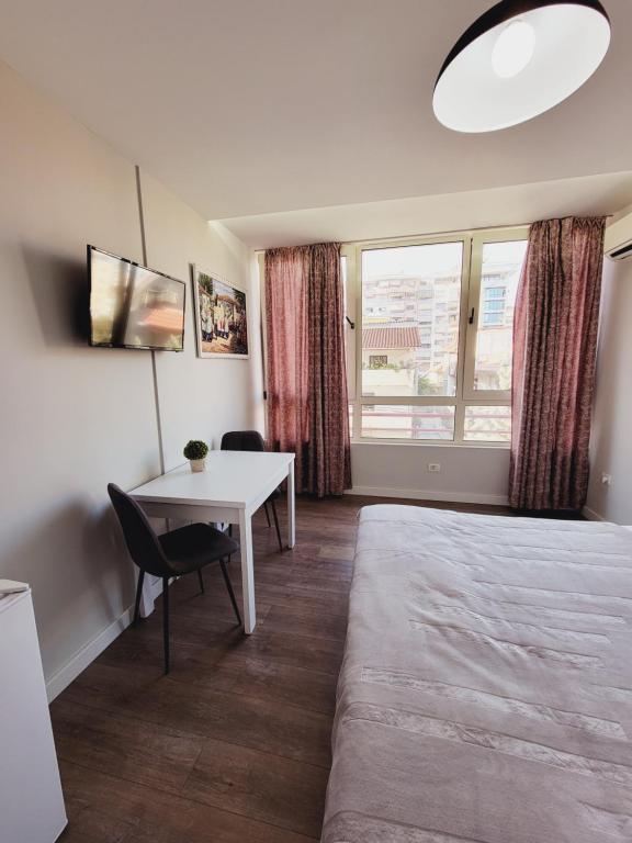 Postel nebo postele na pokoji v ubytování Nuestra Casa