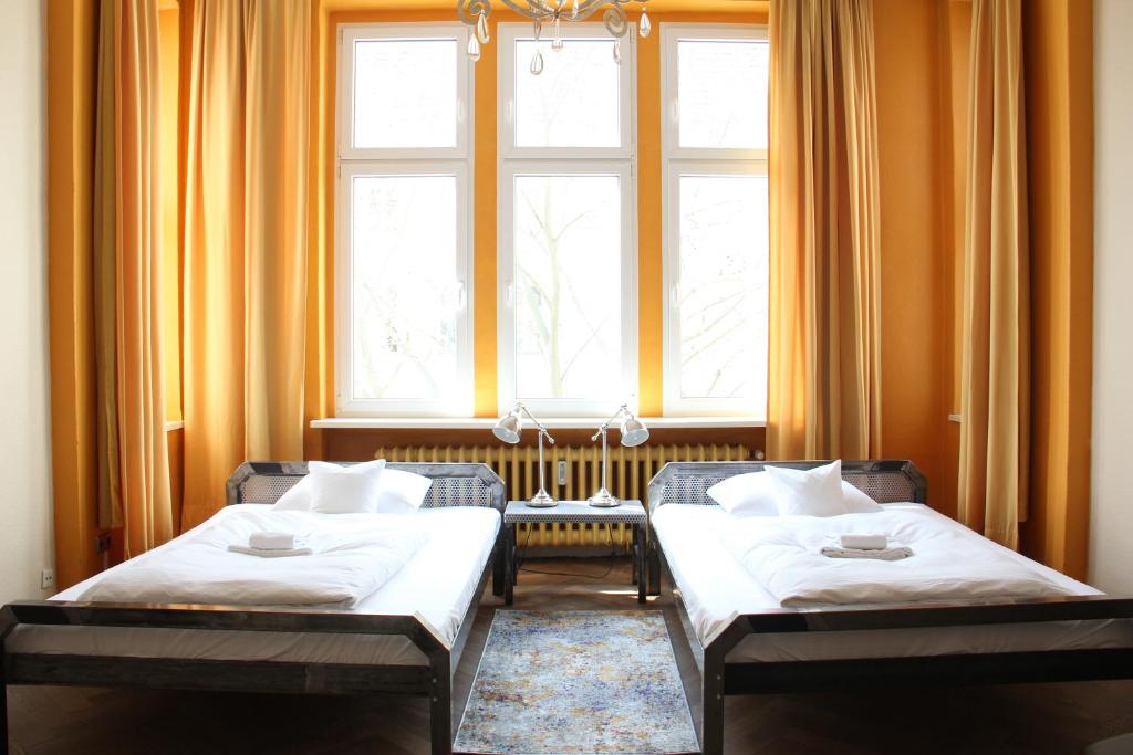 Postel nebo postele na pokoji v ubytování ArtHotel Connection