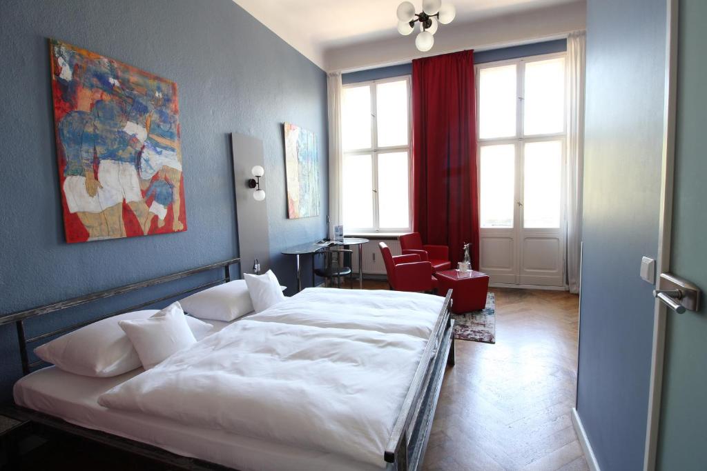 Postel nebo postele na pokoji v ubytování ArtHotel Connection