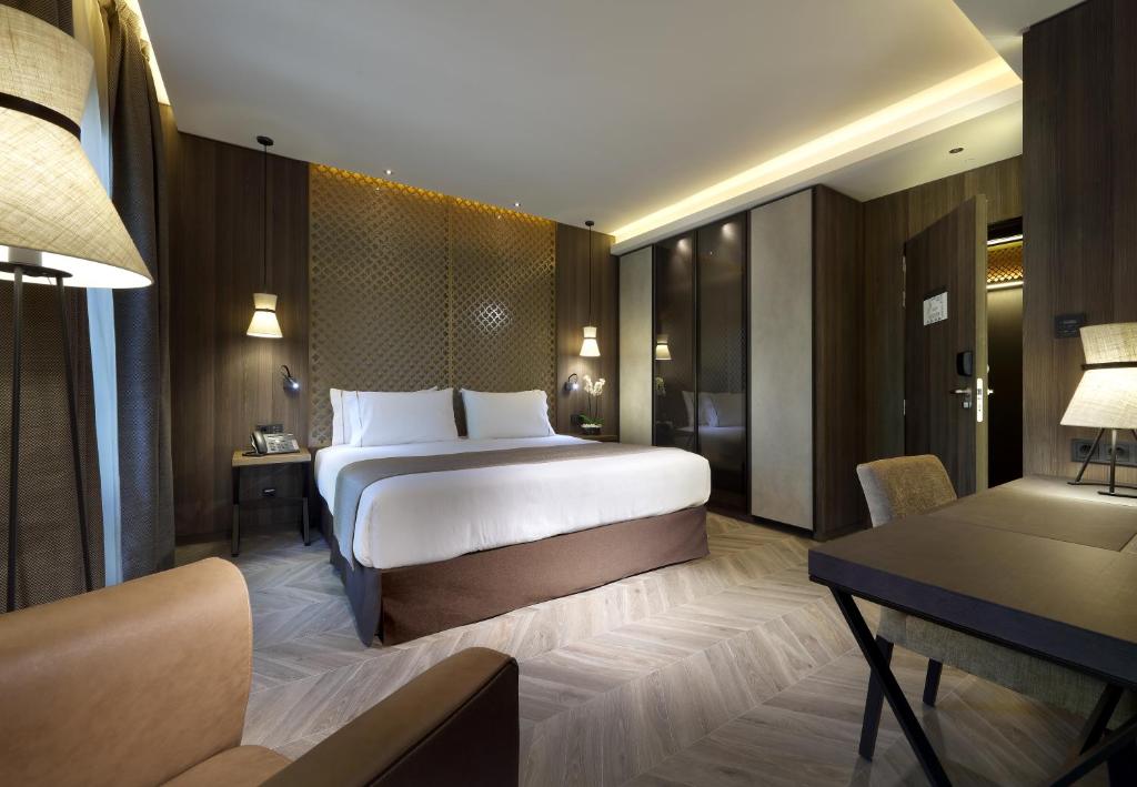 Posteľ alebo postele v izbe v ubytovaní Áurea Washington Irving by Eurostars Hotel Company