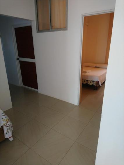 Postel nebo postele na pokoji v ubytování Hostal Terito