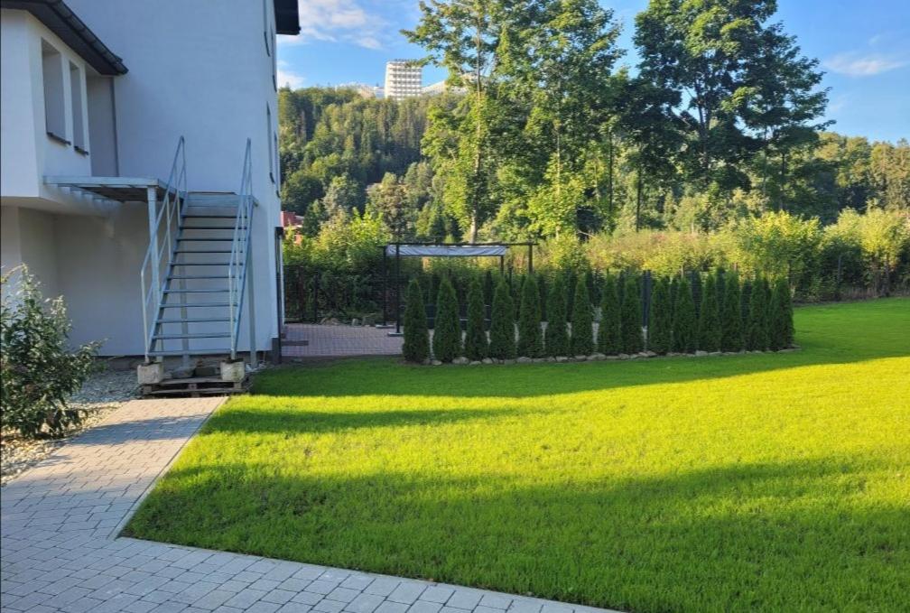 Zahrada ubytování Apartamenty Wisła Lipowa 16-4D