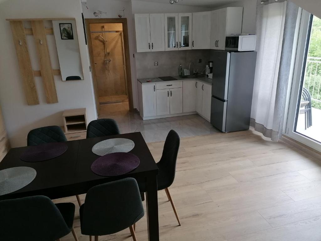 Kuchyň nebo kuchyňský kout v ubytování Apartamenty Wisła Lipowa 16-4D