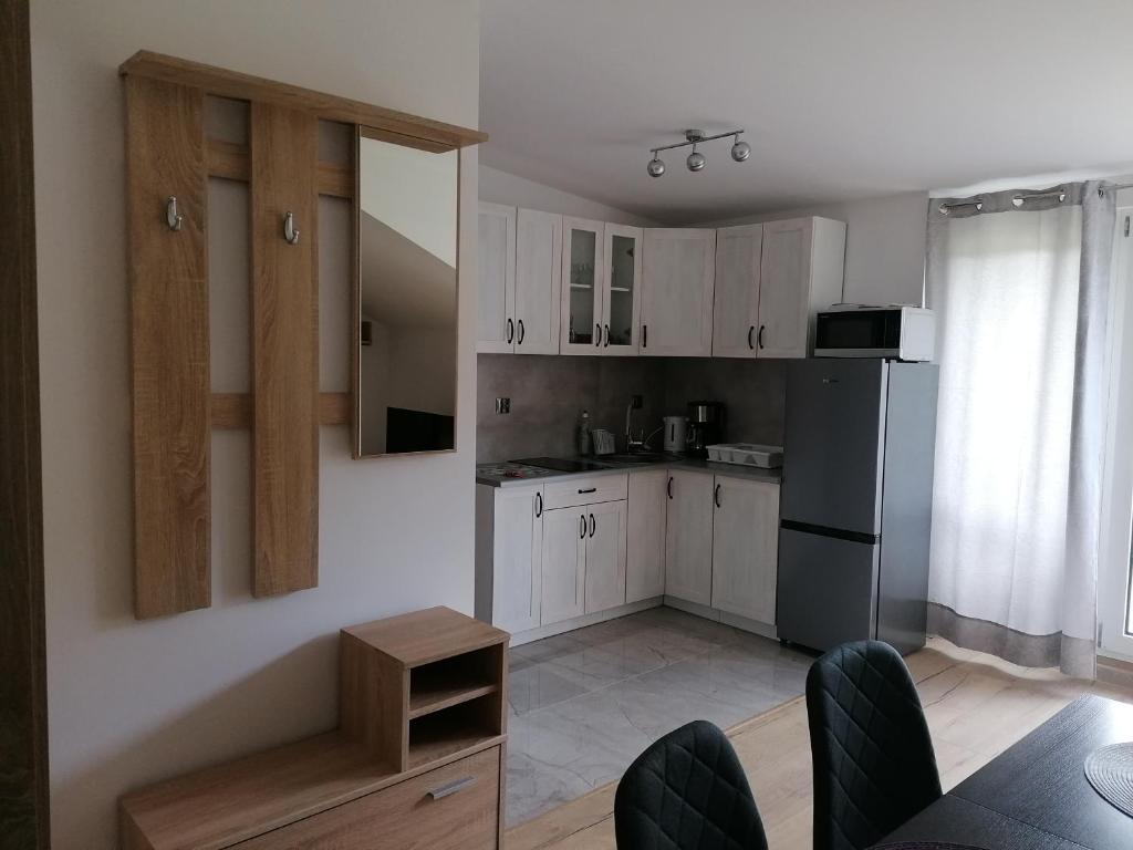 Kuchyň nebo kuchyňský kout v ubytování Apartamenty Wisła Lipowa 16-4D