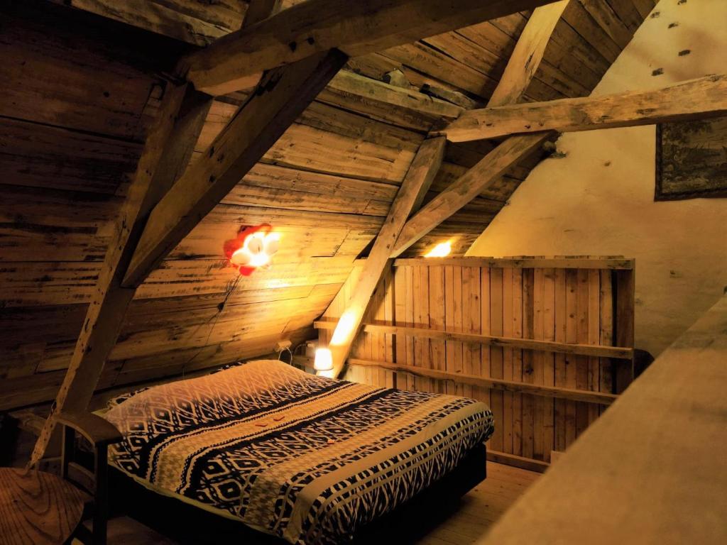 Postel nebo postele na pokoji v ubytování B&B 't Zwaluwnest