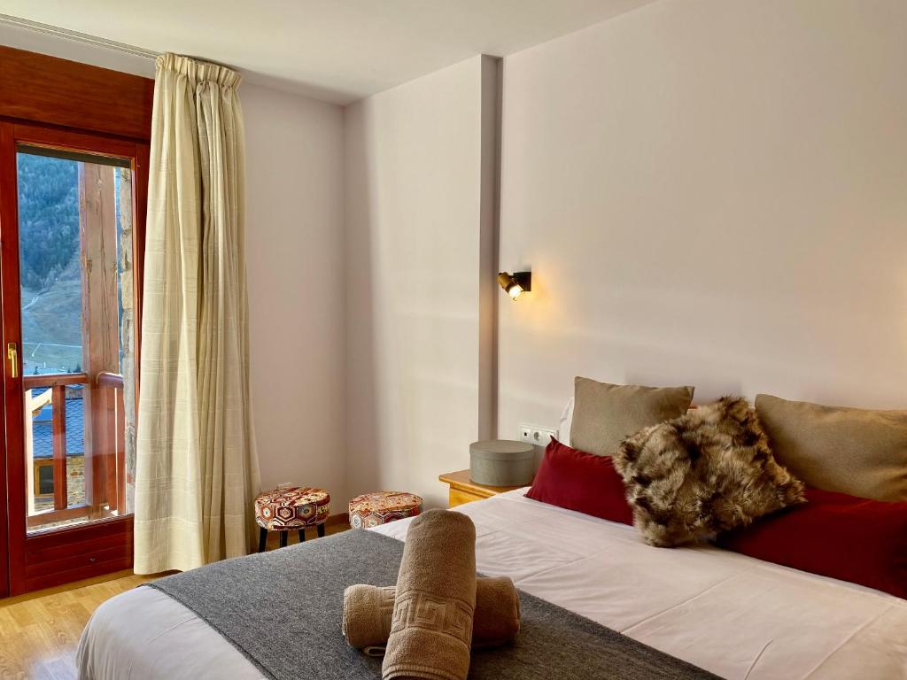 Postel nebo postele na pokoji v ubytování PROBER_TERRASSES DEL TARTER
