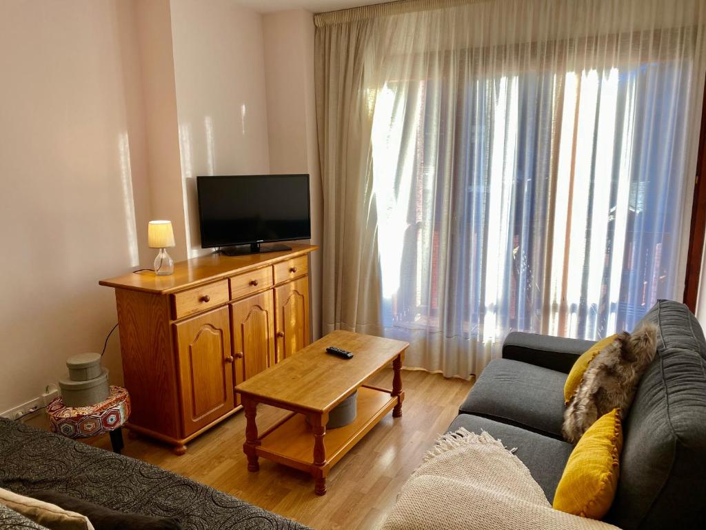 TV a/nebo společenská místnost v ubytování PROBER_TERRASSES DEL TARTER