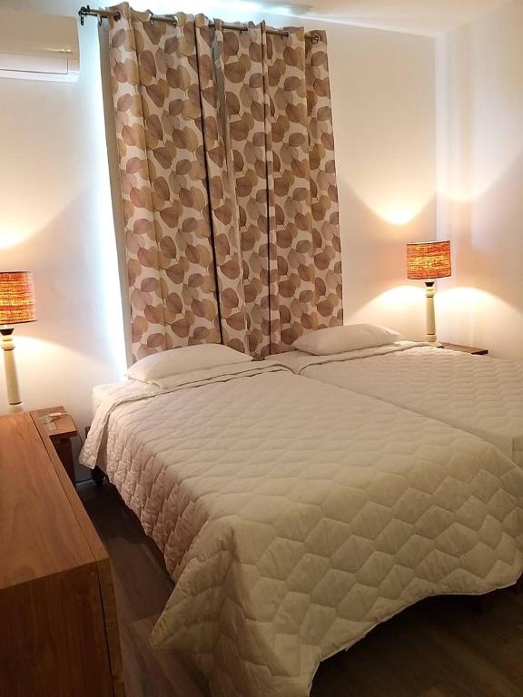 Postel nebo postele na pokoji v ubytování Villa Trochetia