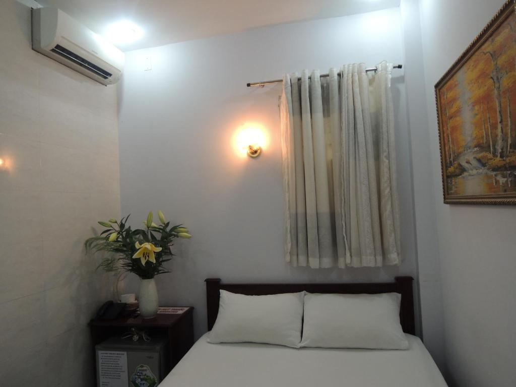 Voodi või voodid majutusasutuse Vy Khanh Guesthouse toas