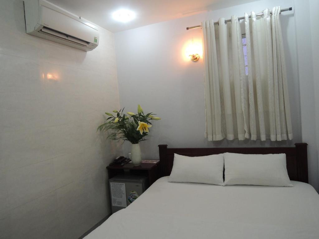 Voodi või voodid majutusasutuse Vy Khanh Guesthouse toas