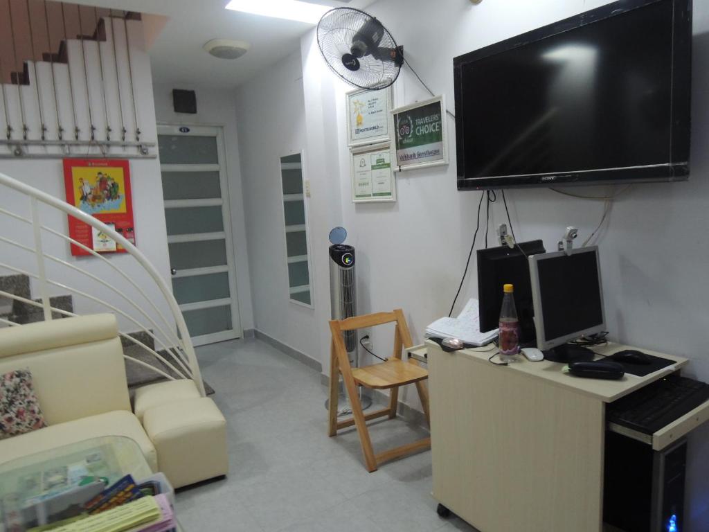 Televiisor ja/või meelelahutuskeskus majutusasutuses Vy Khanh Guesthouse