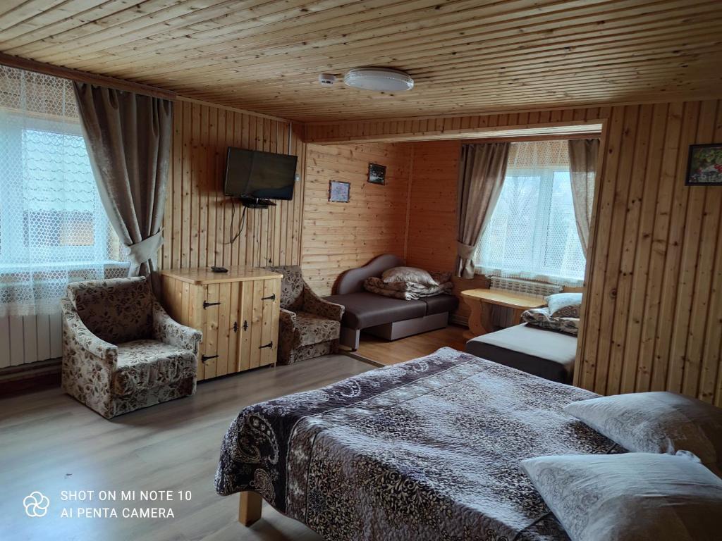 Postel nebo postele na pokoji v ubytování Sadyba Geredzhuka