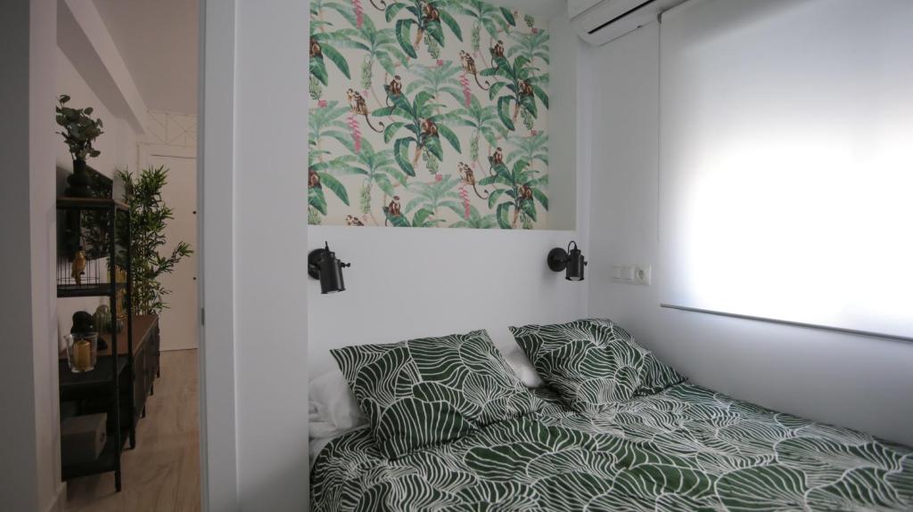 Posteľ alebo postele v izbe v ubytovaní Cute Central Apartment