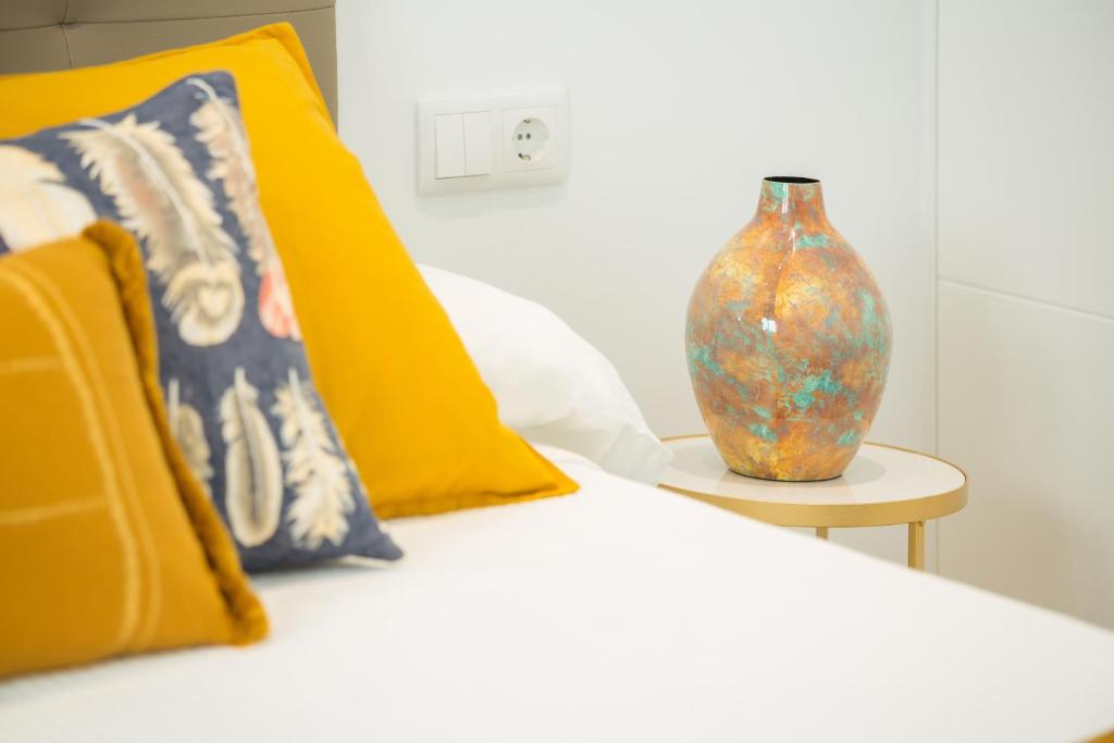 A bed or beds in a room at Hercot Canteras Relax