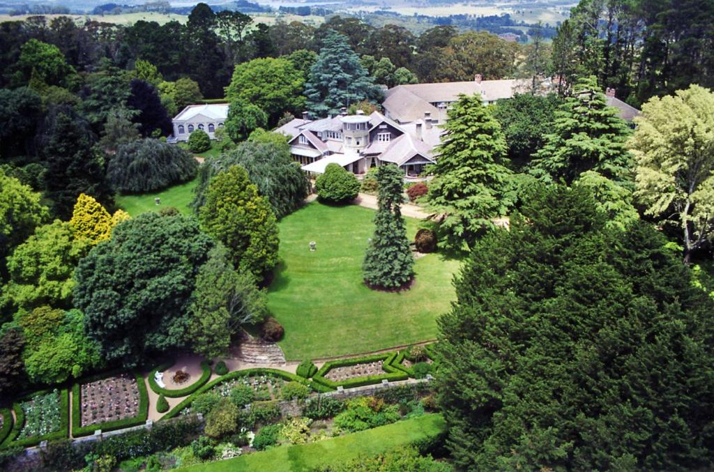 an aerial view of a house with a garden at Milton Park Country House Hotel & Spa in Bowral