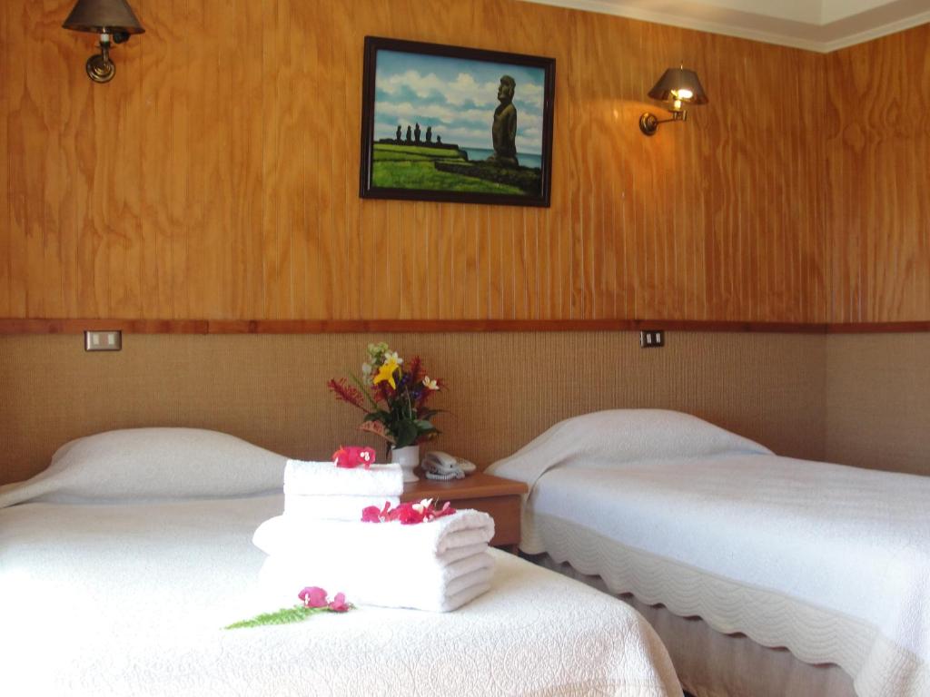 Postel nebo postele na pokoji v ubytování Iorana Isla de Pascua Hotel
