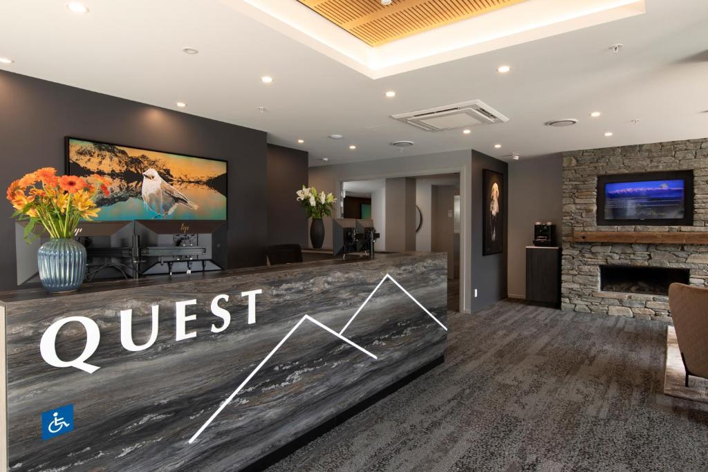 Quest Queenstown Apartments Remarkables Parkにあるテレビまたはエンターテインメントセンター