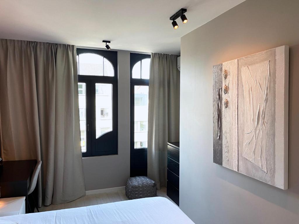 Postelja oz. postelje v sobi nastanitve 3 Room Luxury Design Apartment with Airconditioning, Close to Gent St-Pieters Station