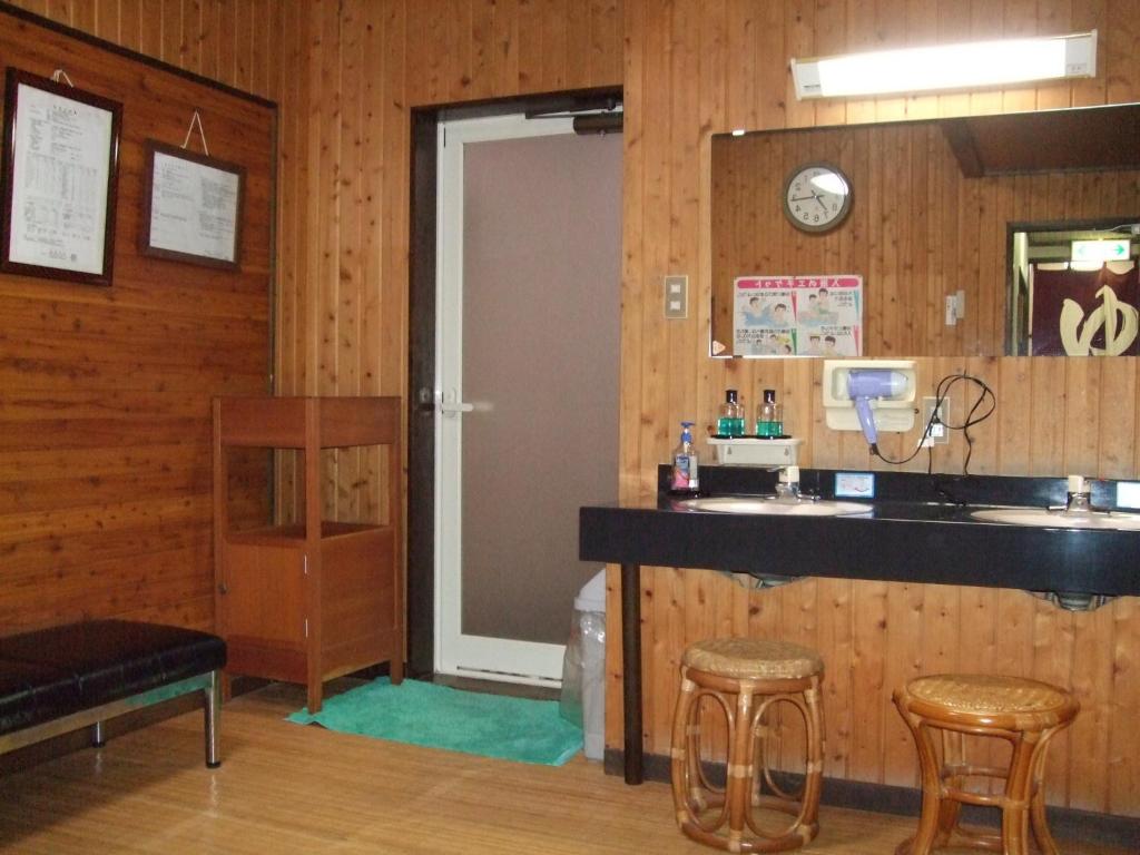 Kuchyň nebo kuchyňský kout v ubytování Marunaka Ryokan