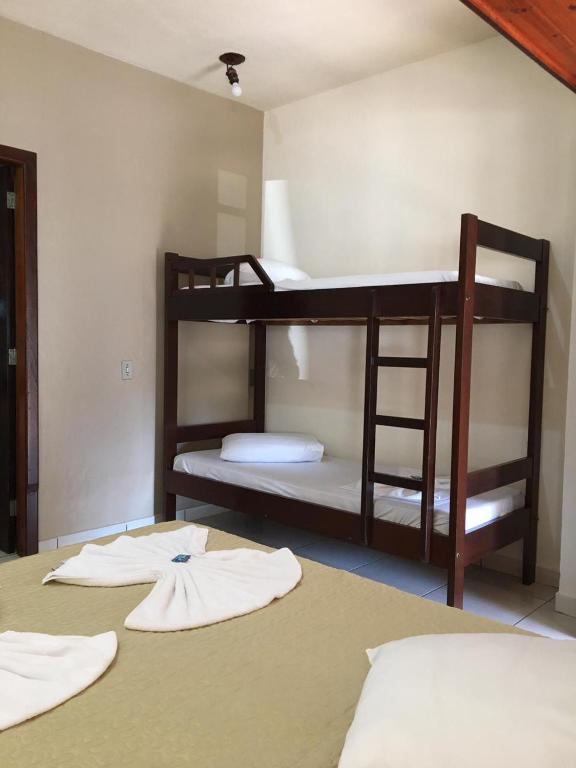 Cama ou camas em um quarto em Hotel D'Luz