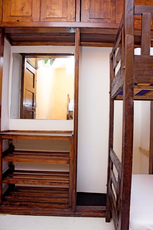 Postel nebo postele na pokoji v ubytování Tulia House Backpackers