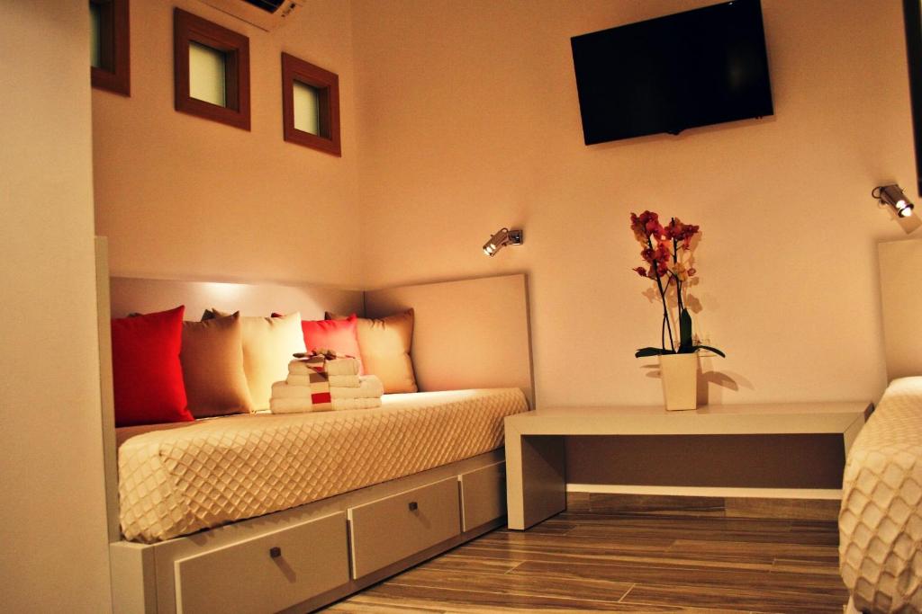 A bed or beds in a room at Lindos Beauty