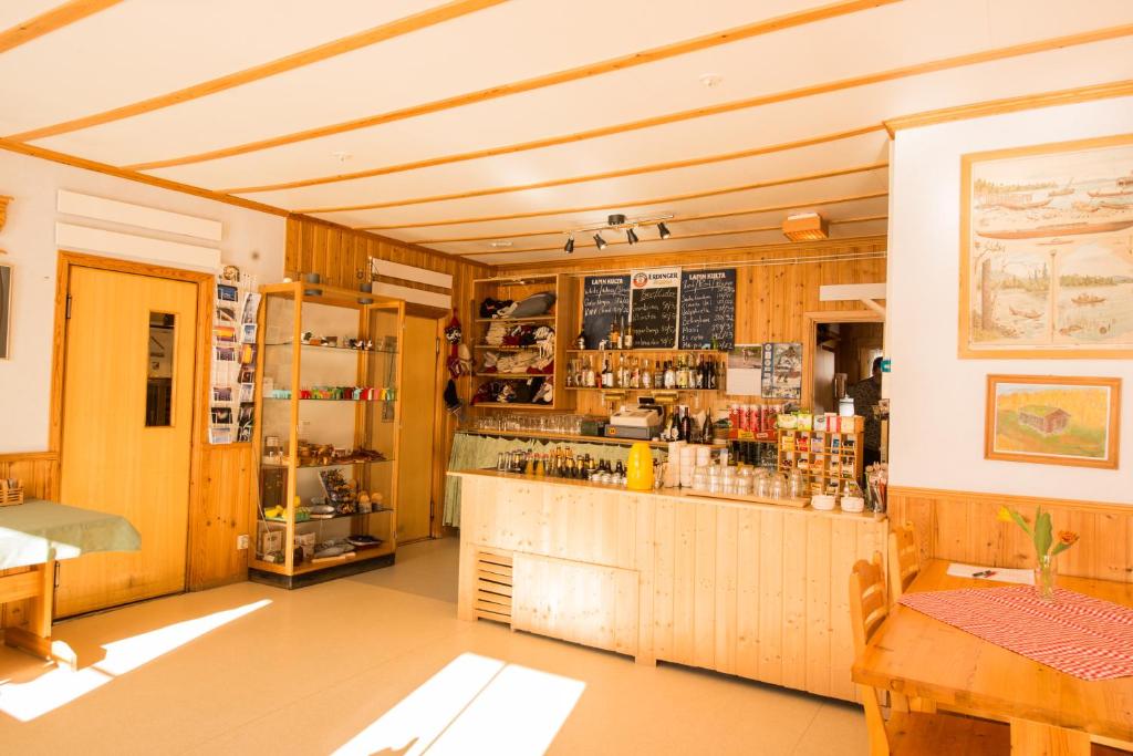 Lounge nebo bar v ubytování Rajamaa In Lapland