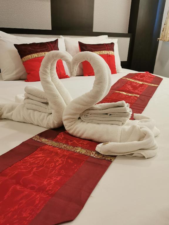 Postel nebo postele na pokoji v ubytování Regent Suvarnabhumi Hotel