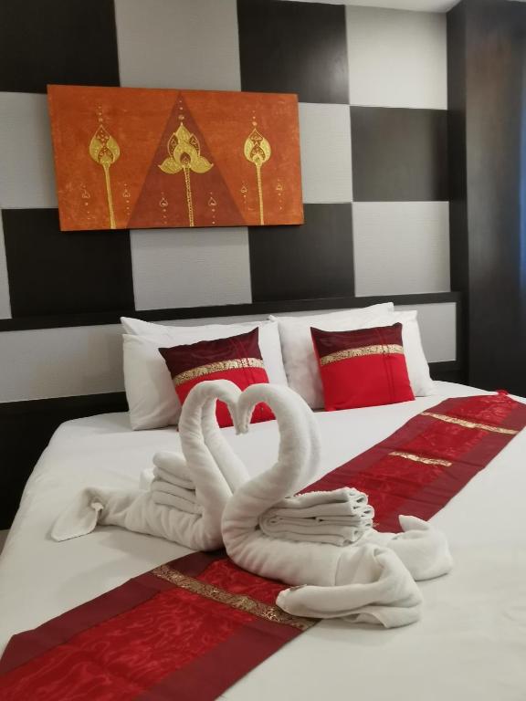 Postel nebo postele na pokoji v ubytování Regent Suvarnabhumi Hotel
