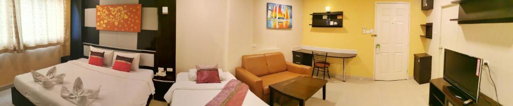 TV a/nebo společenská místnost v ubytování Regent Suvarnabhumi Hotel