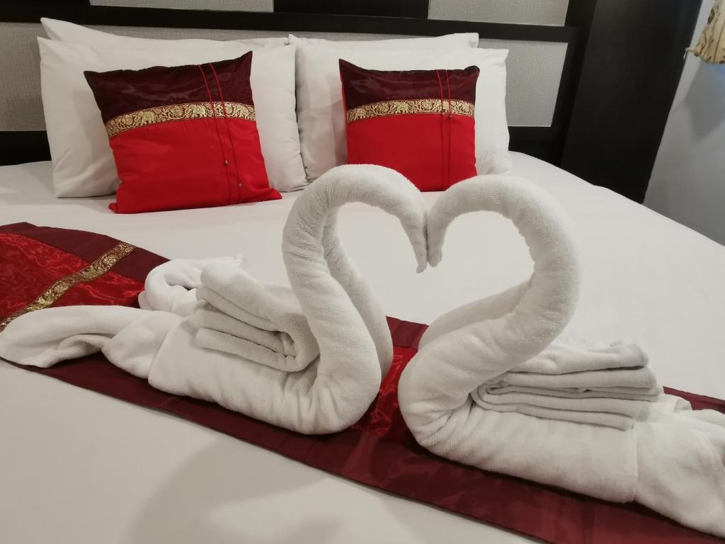 Postel nebo postele na pokoji v ubytování Regent Suvarnabhumi Hotel