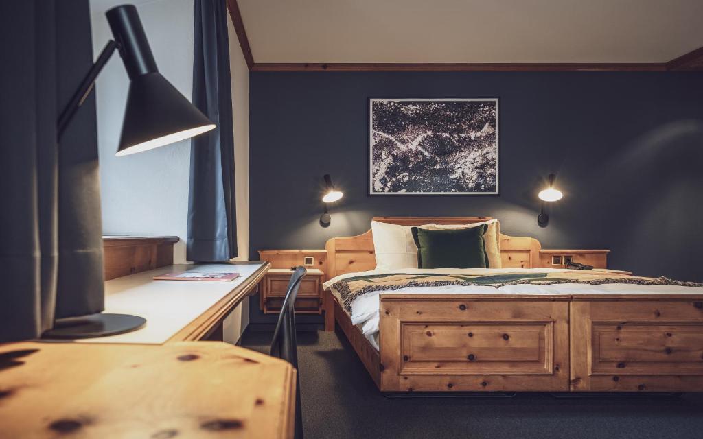 Postel nebo postele na pokoji v ubytování Hotel Davoserhof by Mountain Hotels