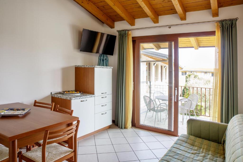 TV a/nebo společenská místnost v ubytování Residence Molino - Holiday Apartments