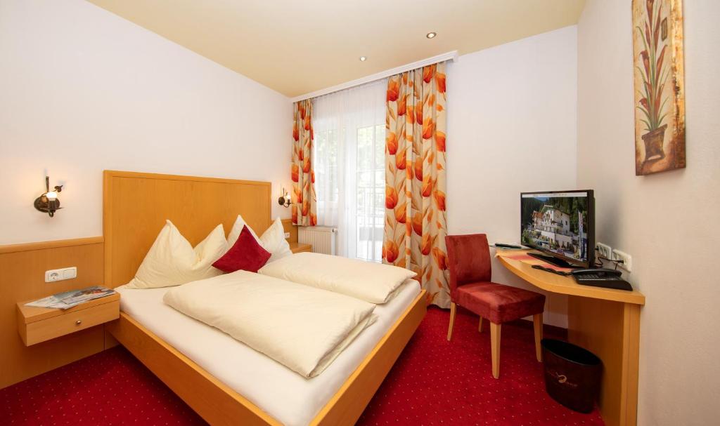 TV a/nebo společenská místnost v ubytování Hotel Der Schmittenhof