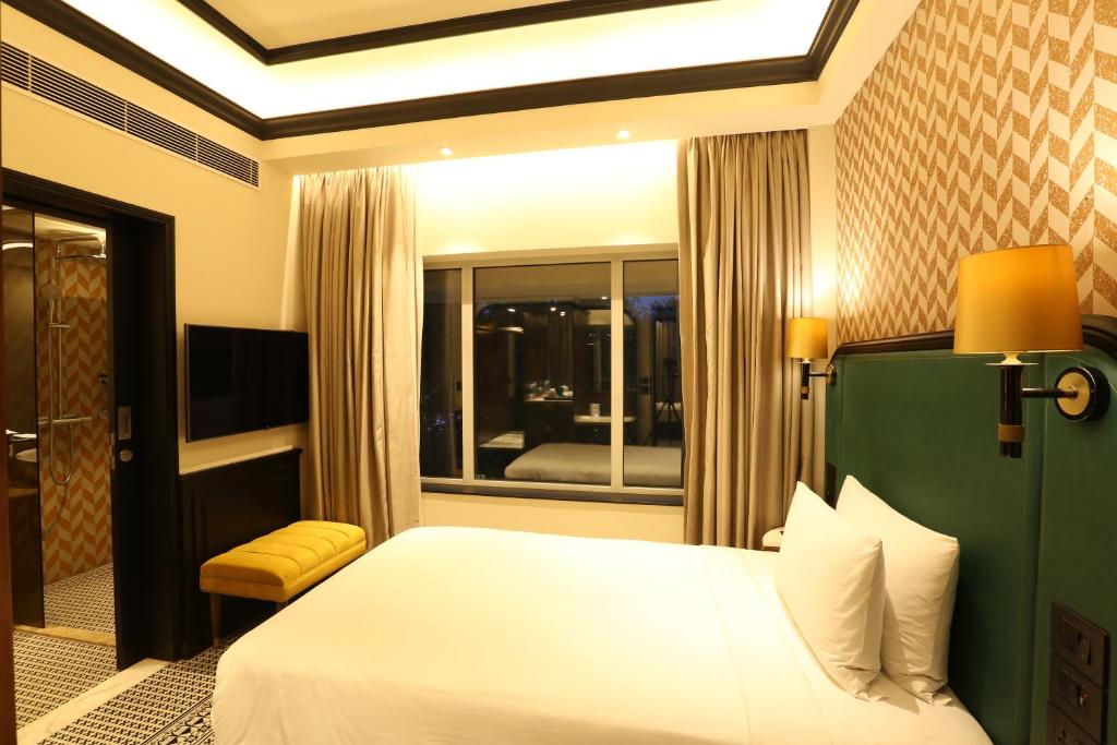 Postel nebo postele na pokoji v ubytování The Connaught, New Delhi- IHCL SeleQtions