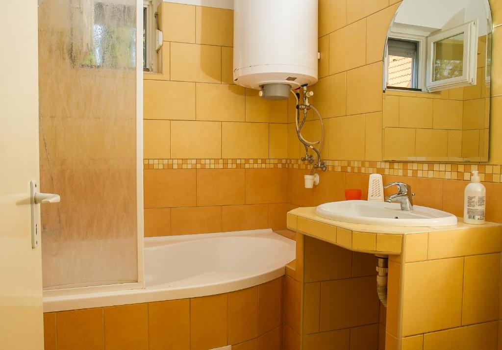 Kúpeľňa v ubytovaní Familia nyaraló 163