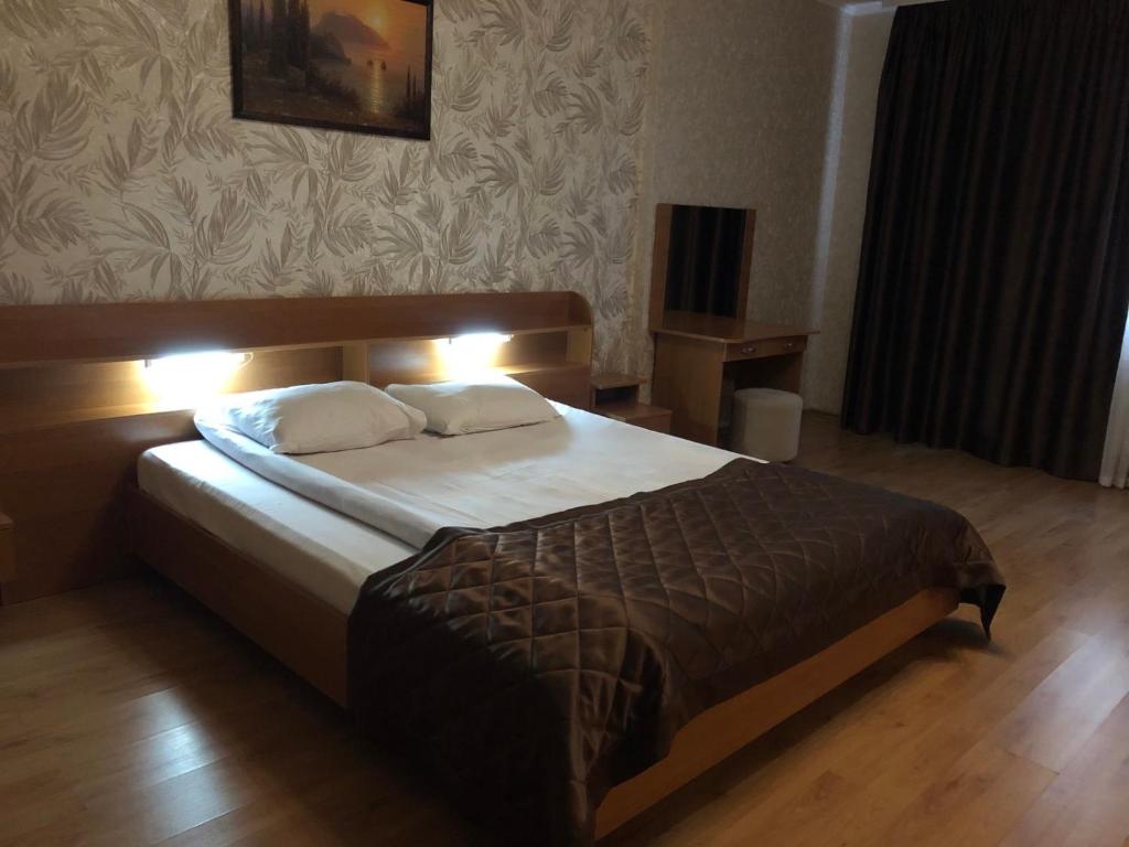 Postel nebo postele na pokoji v ubytování Comfort Hotel