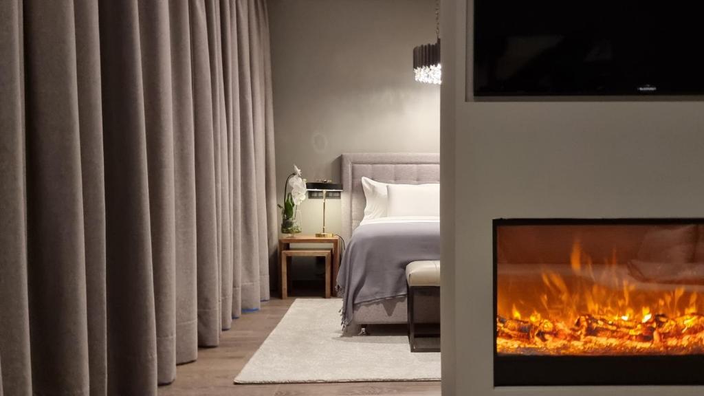 Postel nebo postele na pokoji v ubytování DS Hotel Lusopark
