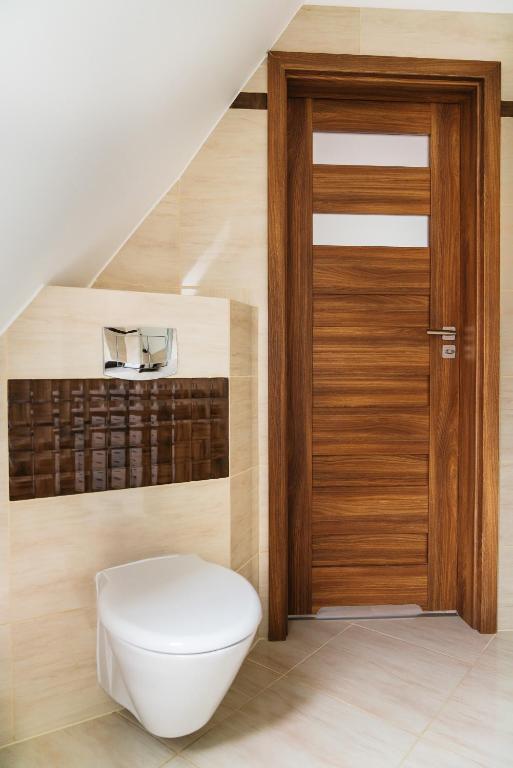 Kúpeľňa v ubytovaní Apartamenty Domino - Kościelisko