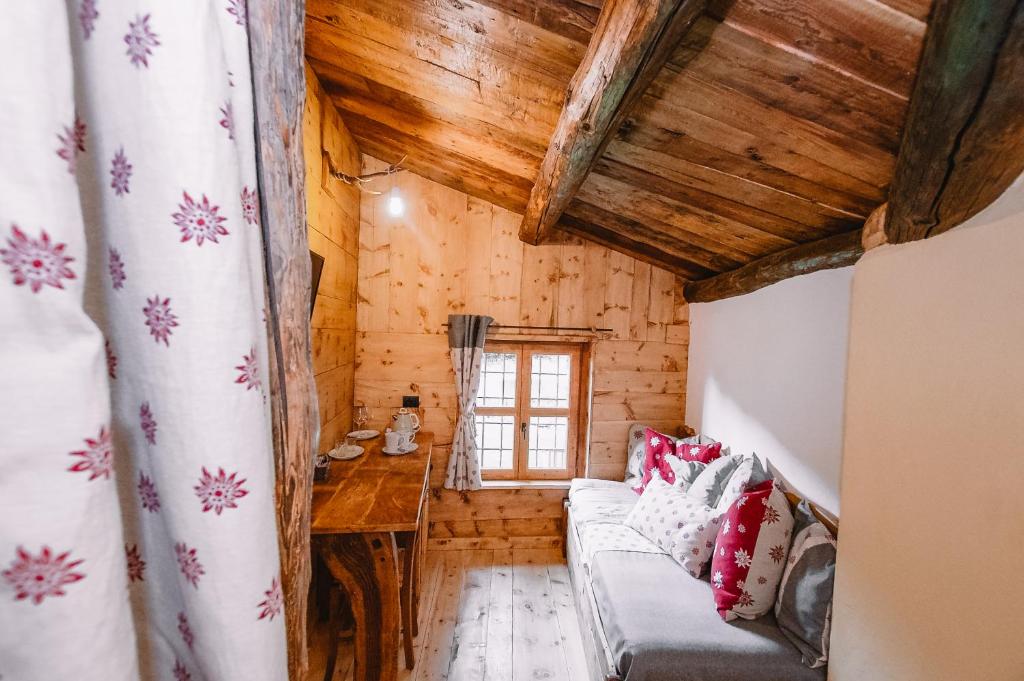 Postel nebo postele na pokoji v ubytování L'Escola e Lou Mulin