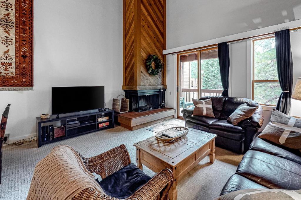 a living room with two couches and a television at Gold Bend 5034 in Truckee