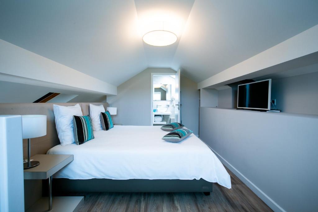 Postel nebo postele na pokoji v ubytování Auberge des Grands Bois