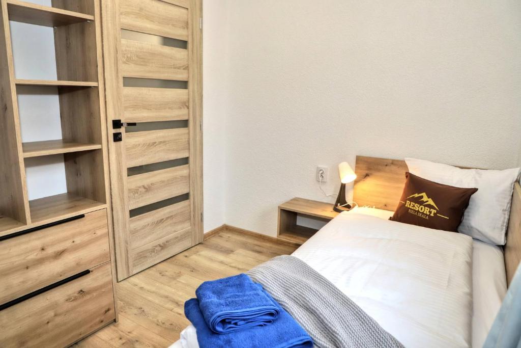 Postel nebo postele na pokoji v ubytování Resort Biela Skala - CHALET Chopok Jasná Juh