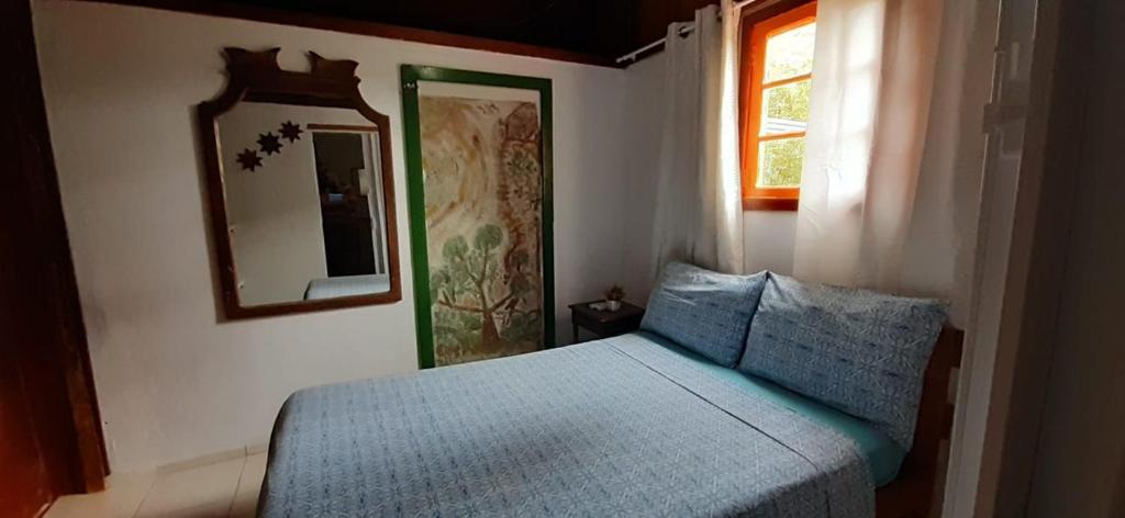 Postel nebo postele na pokoji v ubytování Pousada Cantuá