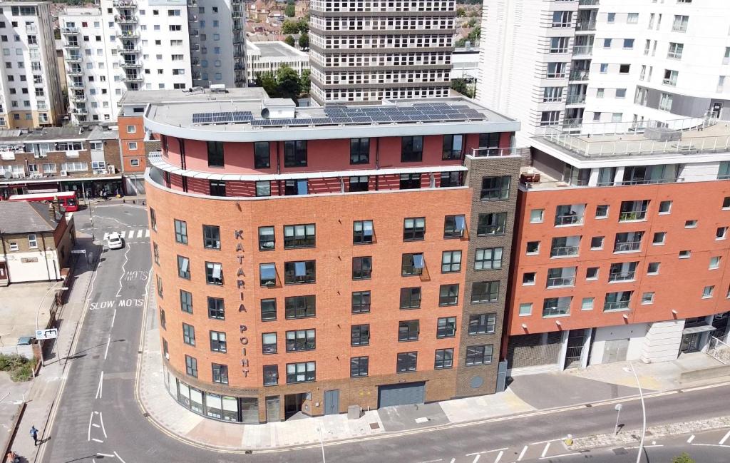 an overhead view of a brick building in a city at Ilford Tower Apartments in Ilford