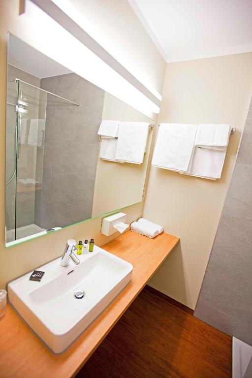 Koupelna v ubytování Sebcity Hotel