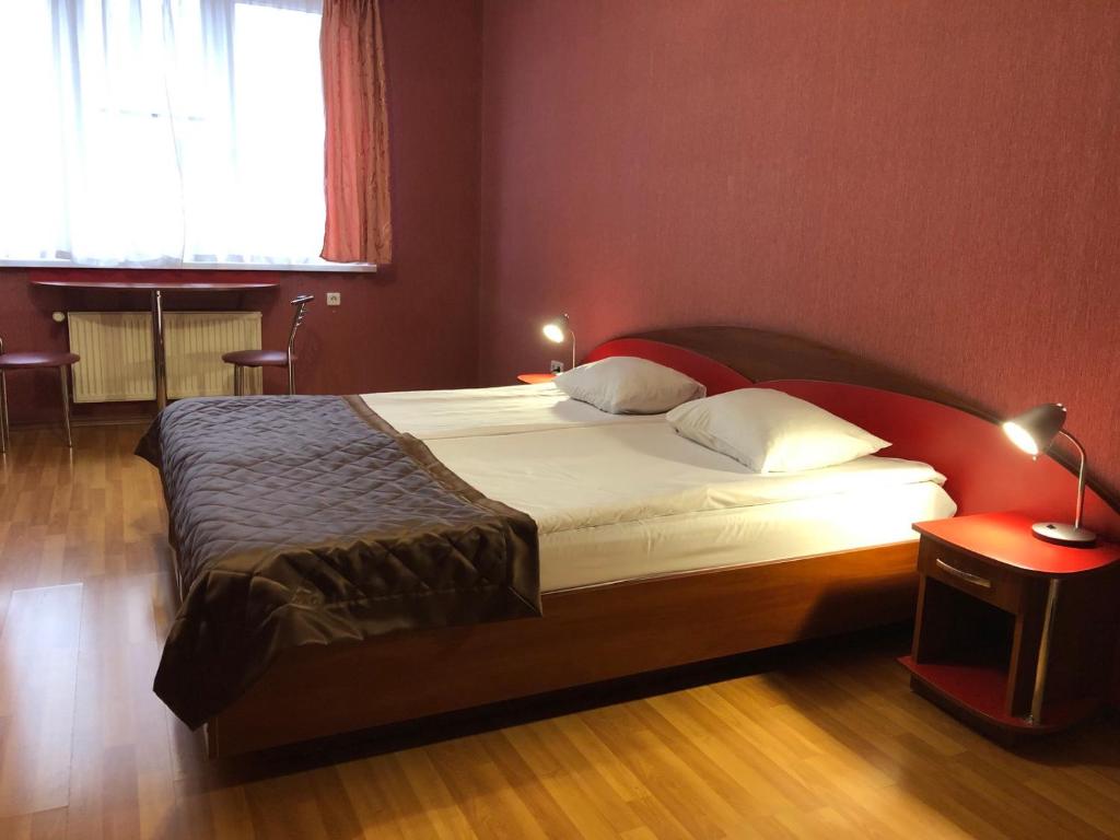 Postel nebo postele na pokoji v ubytování Comfort Hotel