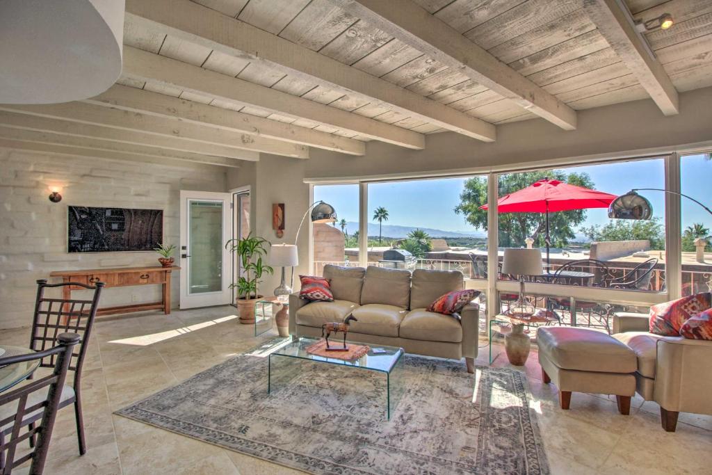 a living room with a couch and a table at Catalina Foothills, Tucson Valley Hub with View in Tucson