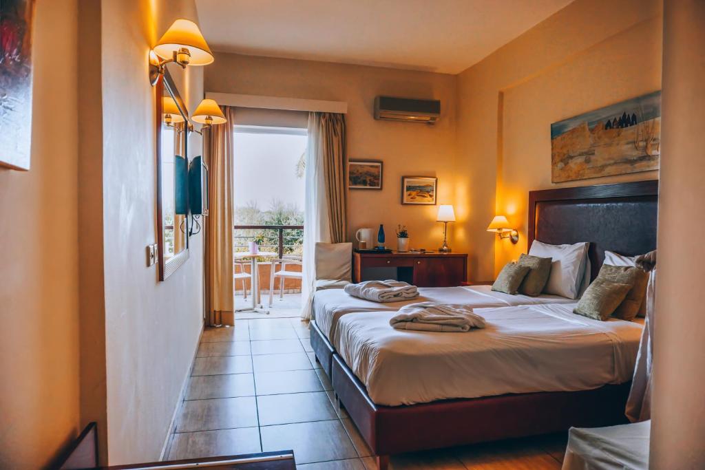 Voodi või voodid majutusasutuse Apollo Resort Art Hotel toas